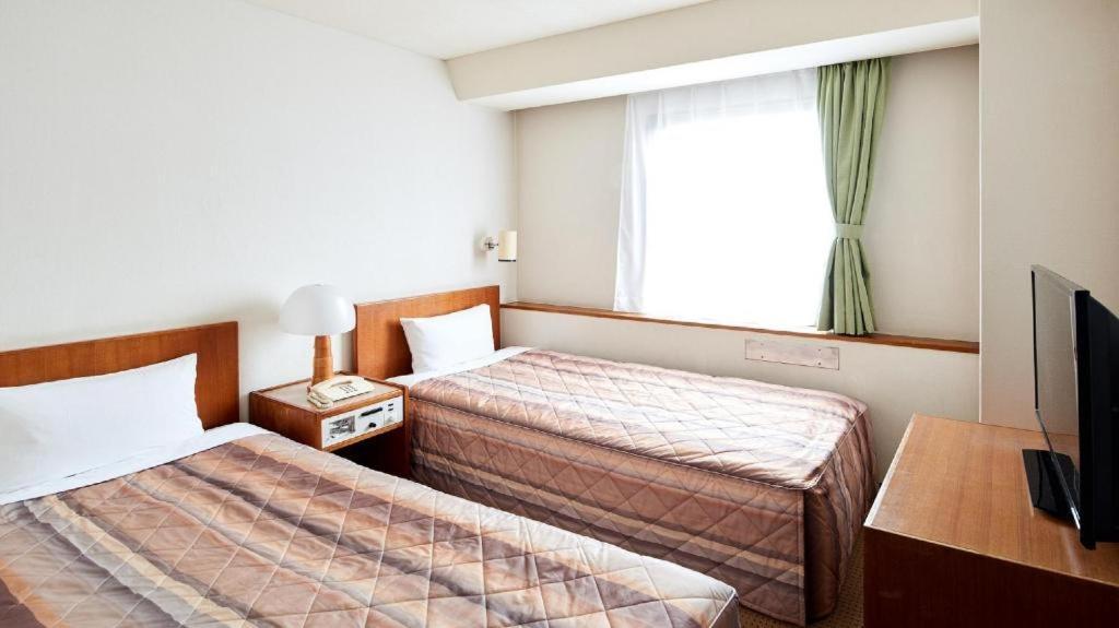 Marroad Inn Tokyo Футю Экстерьер фото