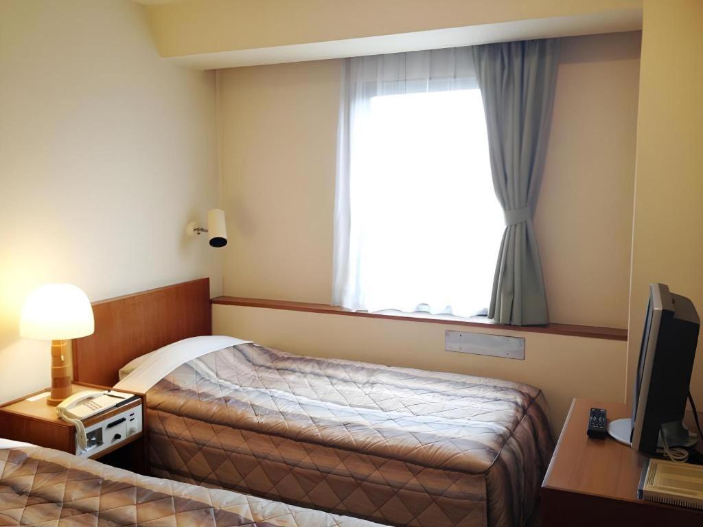 Marroad Inn Tokyo Футю Экстерьер фото